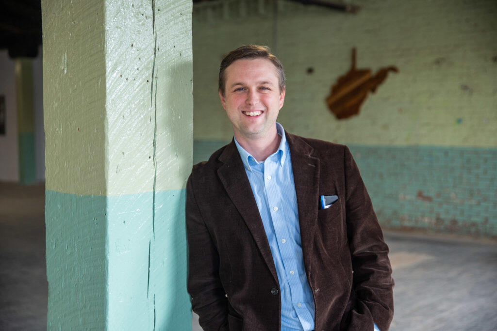 Brandon Dennison poses for a photo