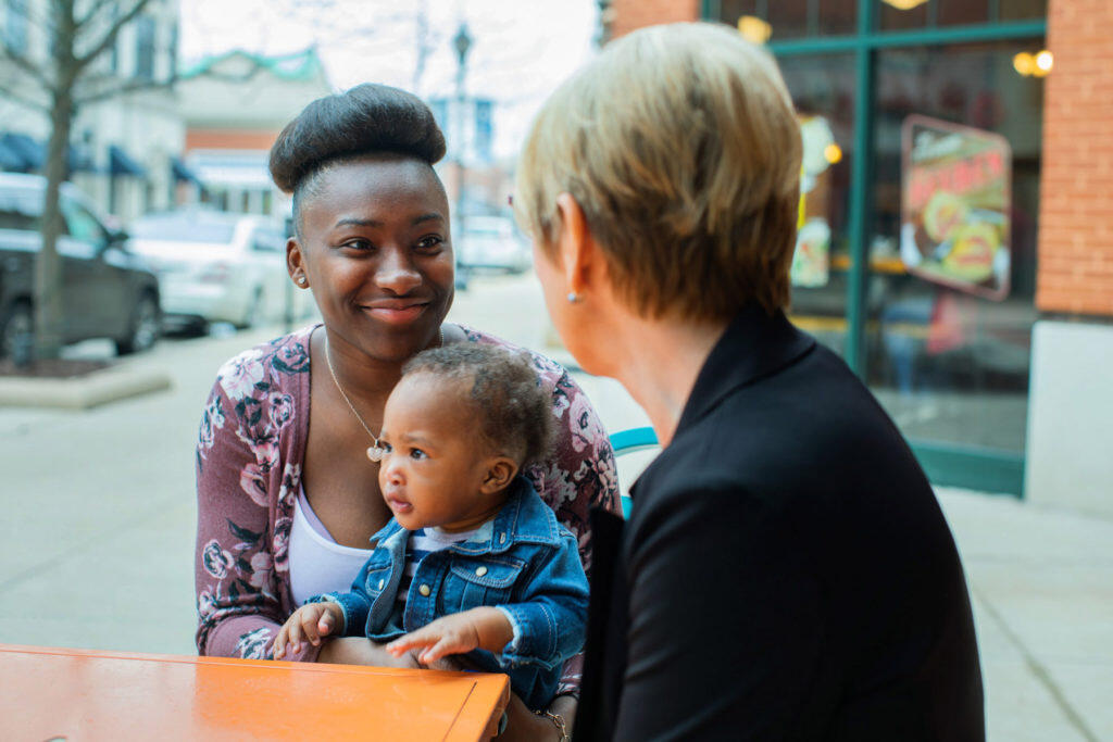 Essence meeting with her mentor, Carrie