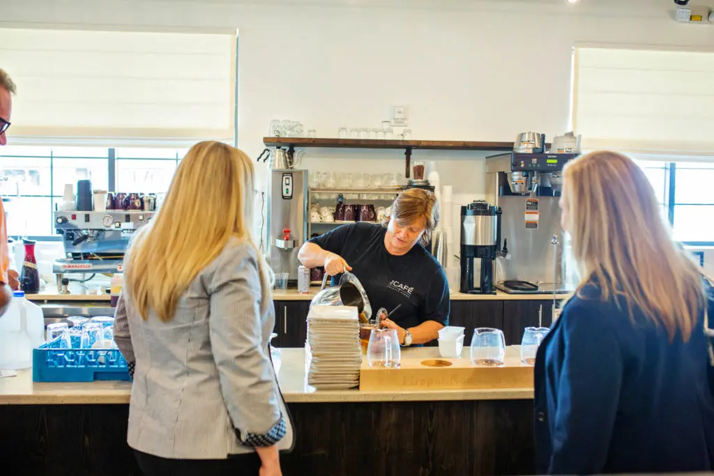 Customers wait for their order at the Thistle Farms cafe