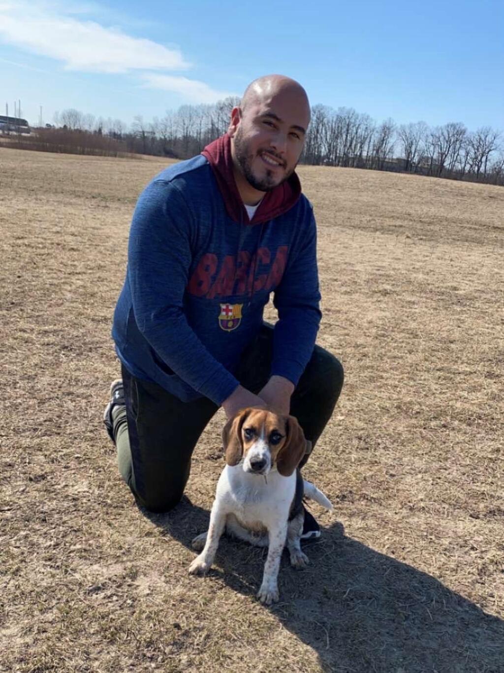 Abe Gonzalez with his dog